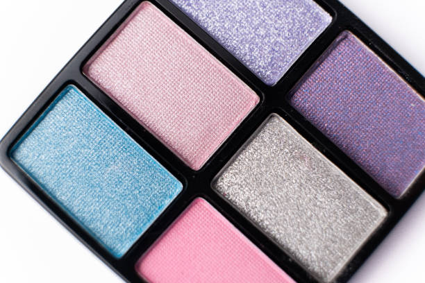 istock Glitter eye shadow palette on white background close-up. 2160564125