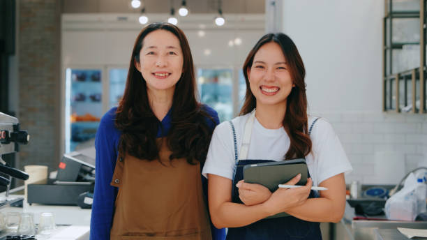 istock Happy Team at Work: Successful Small Business Owners in Cafe 2160564372