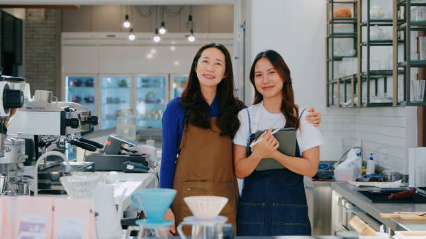 istock Friendly Cafe Team: Professional Women Running a Successful Small Business 2160564833