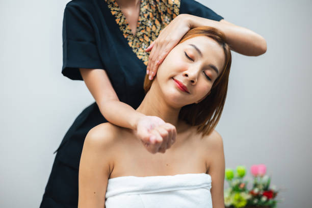 istock woman is getting a massage from a masseuse 2160569863