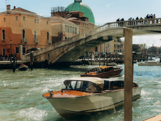 Venice, Italy - april 2,2023: Venice Grand Canal, tourists riding gondolas . High quality photo