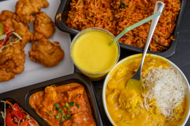Selection of dishes in an Indian restaurant, various items on the table, top view