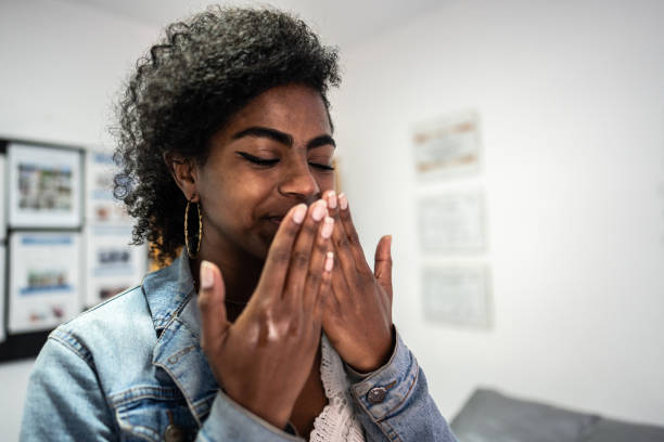 istock Young woman smelling hands on beauty spa 2160575184