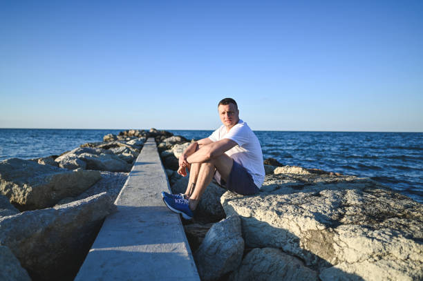 istock Portrait of athlete man taking a break. 2160576947