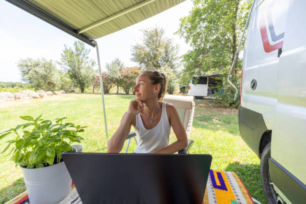 istock Sunshine and Smiles: Woman Working Outdoors 2160581923