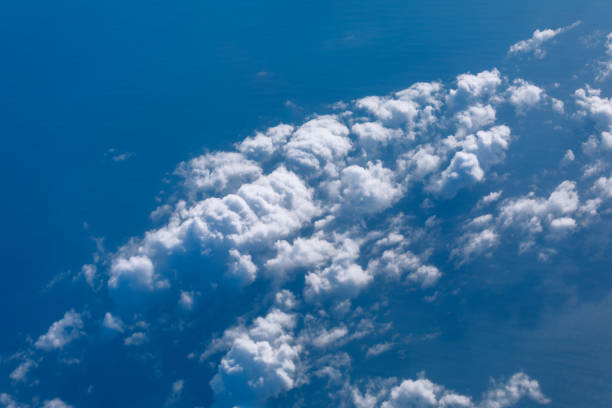 istock Aerial perspective of fluffy clouds 2160583104