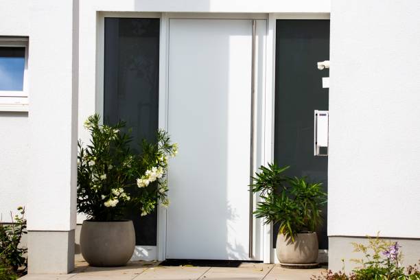 istock Modern white front door on a residential building 2160586477