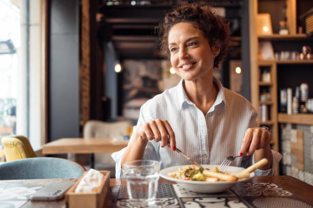 istock A restaurant owner enjoys a Caesar salad in his own restaurant on a break 2160586863