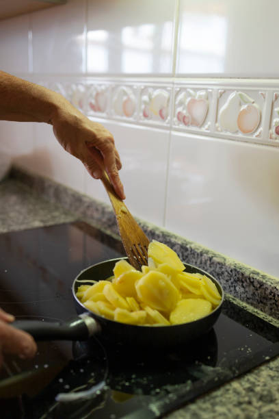 istock Cooking Potatoes in a Pan for Spanish Tortilla 2160594529