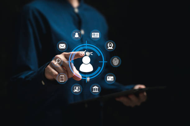 istock E-KYC, Electronic Know Your Customer, Digital identity verification, Businesswomen touch on E-KYC icos, Fingerprint scanning, biometric authentication, Cyber security, Banking ,Futuristic technology 2160597027