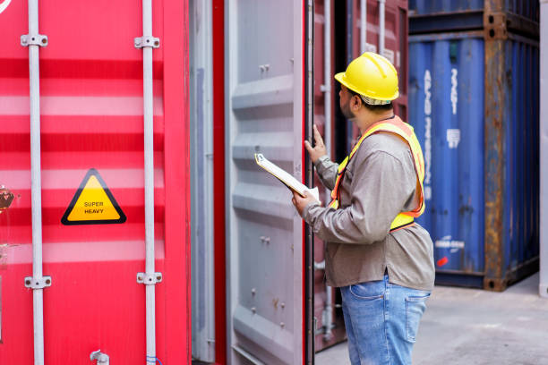 istock Logistic supervisor is inspecting the incoming cargo container at container yard. 2160597115