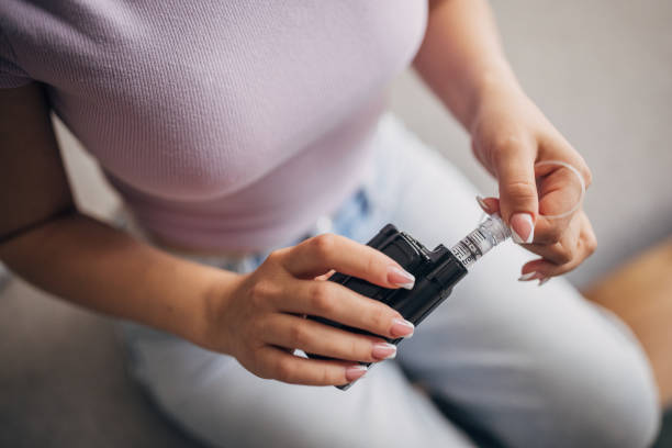 istock Connecting components of a medical device at home. 2160601064