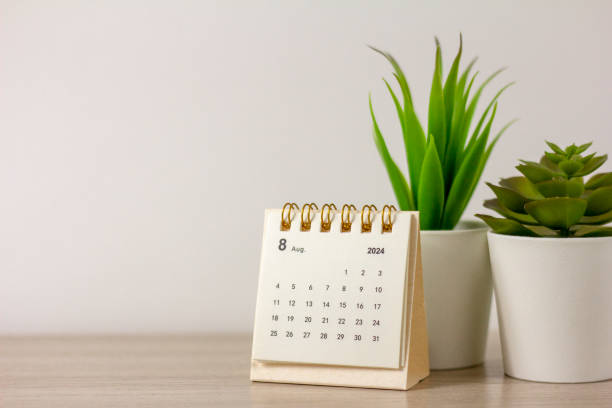 istock August 2024 Monthly Desk Calendar on Desktop. Copy Space. 2160607038