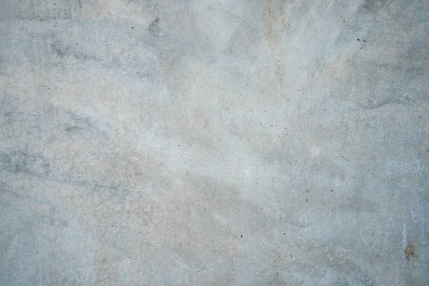 Texture of polished concrete on gray and white background.