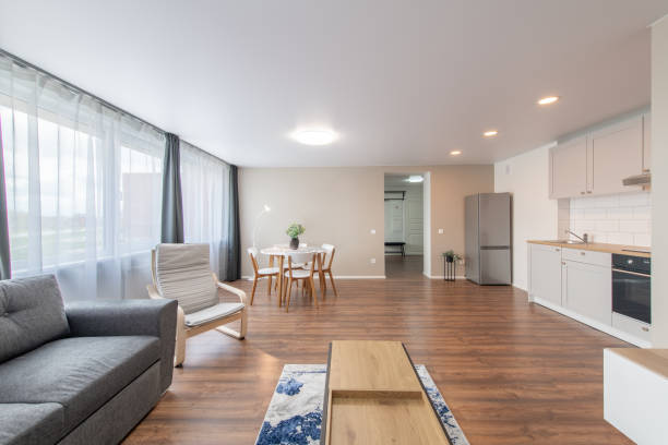 istock Modern Home Living Room and Kitchen Interior. Luxurious Stylish Modern Apartment. Open Space, Stylish Sofa, White Furniture, Scandinavian Design 2160610292