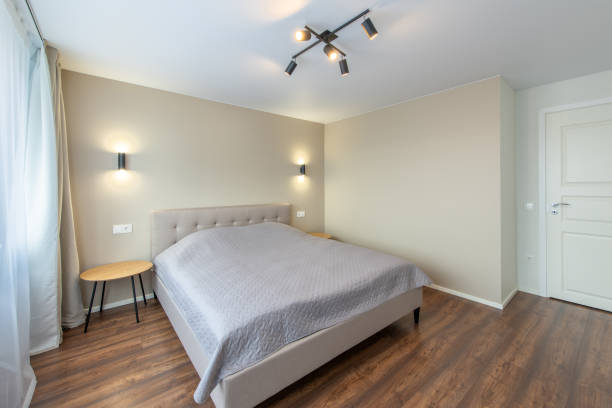istock Minimalism Bedroom Interior. Wardrobe in Background. Coffee Table and Light. Windows and Curtains. Home. 2160610920
