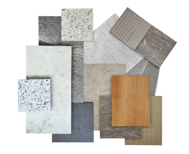istock group on interior construction material samples including marble stone, wooden veneer, fabric swatch, cement and graphic tiles, terrazo, vinyl flooring tile isolated on background with clipping path. 2160613422