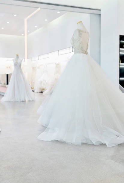istock Beautiful wedding dresses in the store 2160614548