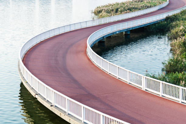 istock Red bridge by the sea 2160614832