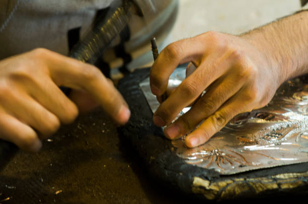 istock copper carving handcrafted decoration product making 2160615927
