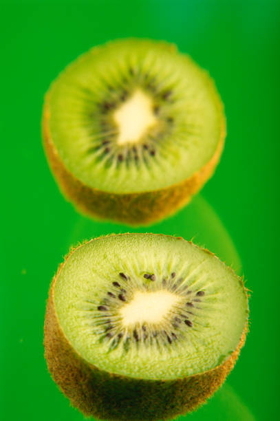 Two pieces of kiwi fruit, close-up. Food.