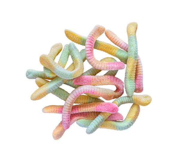 istock Pastel coloured sugar coated gummy worms candy isolated cutout 2160620345