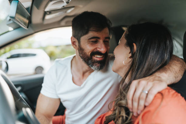 istock Couple hugging in the car 2160622180
