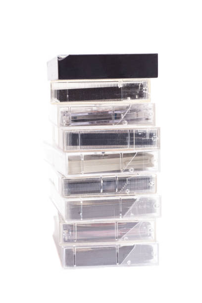 istock Stack of vintage audio cassettes isolated on white 2160622322