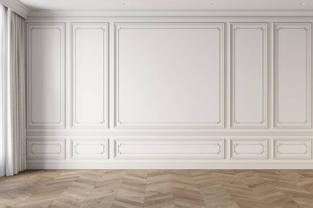 istock Empty classic white interior with blank wall with moldings and chevron wood floor. 3d render illustration mockup. 2160623010