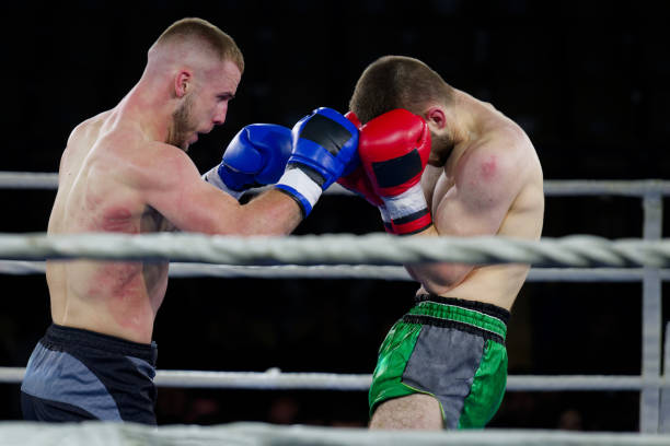 istock Fierce boxing match showcases athletes' power and skill. 2160624082