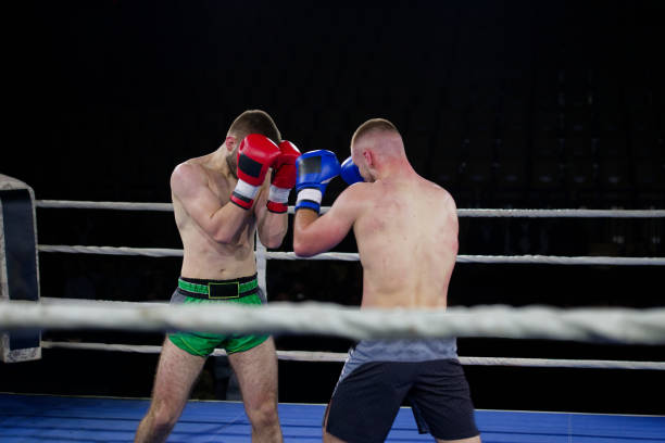 istock Fierce boxing match showcases athletes' power and skill. 2160624181