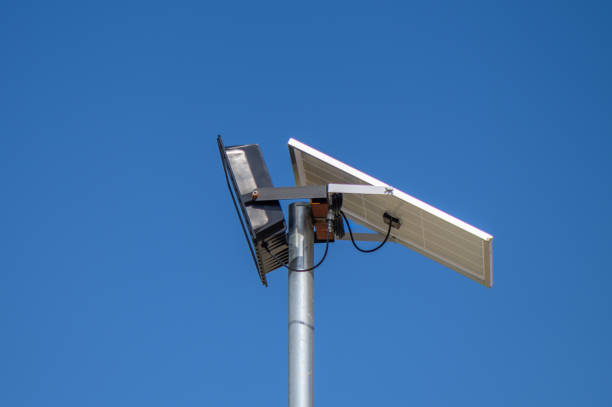 solar-powered street lighting floodlight against the sky