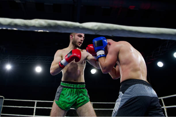 istock Fierce boxing match showcases athletes' power and skill. 2160624471