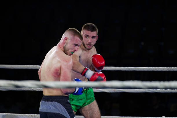 istock Fierce boxing match showcases athletes' power and skill. 2160624516