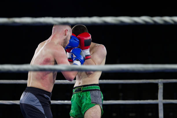 istock Fierce boxing match showcases athletes' power and skill. 2160624611