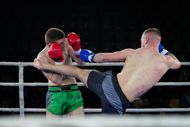 istock Fierce boxing match showcases athletes' power and skill. 2160624673