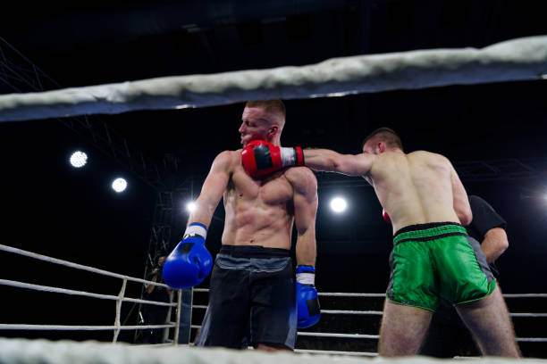 istock Fierce boxing match showcases athletes' power and skill. 2160625559