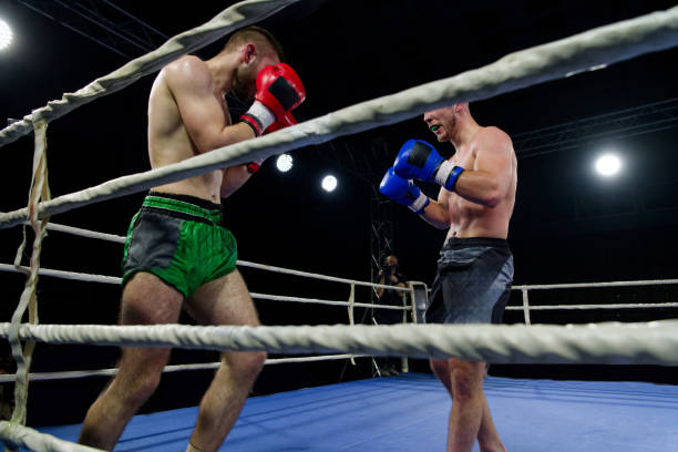 istock Fierce boxing match showcases athletes' power and skill. 2160626579