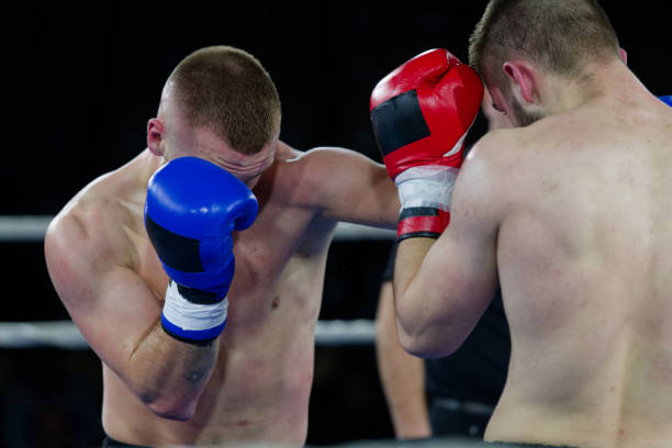 istock Fierce boxing match showcases athletes' power and skill. 2160626776