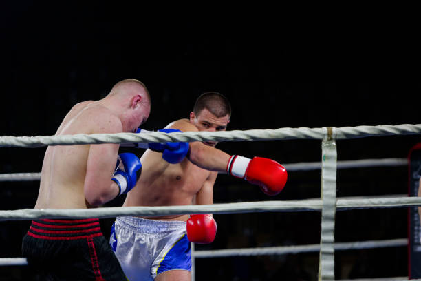istock Fierce boxing match showcases athletes' power and skill. 2160628917