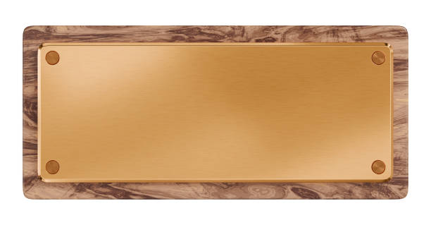 Golden plaque with rivets on wooden board. Isolated metallic nameboards. 3D rendering. Golden plaque with rivets on wooden board. Isolated metallic nameboards. 3D rendering bronze plaque texture stock pictures, royalty-free photos & images