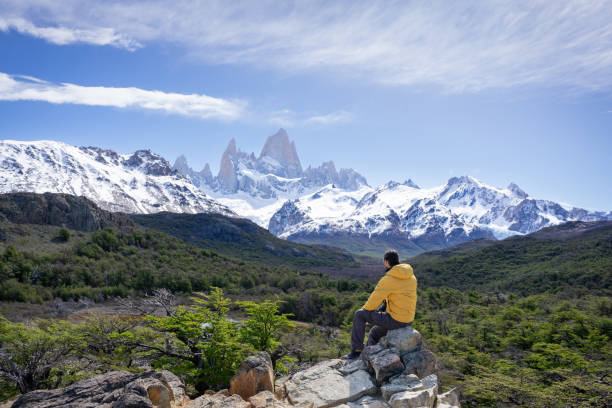 istock man sitting contemplating fitz roy mount 2160642439