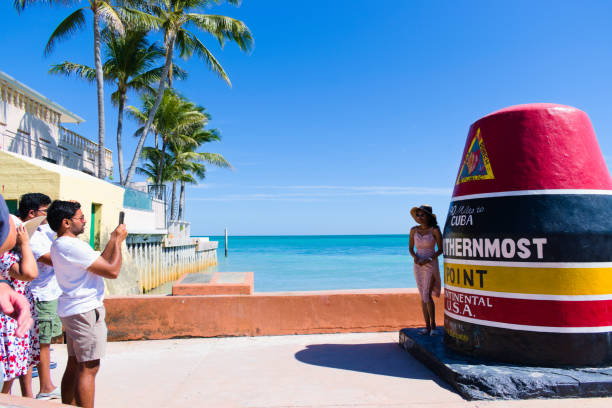 Concrete buoy at Southernmost Point of the continental USA landmark on a beautiful day, Key West, Florida