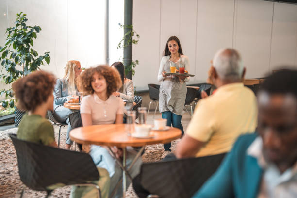 istock Multi-Generational Family Relishes Time Together in a Modern Cafe 2160646824