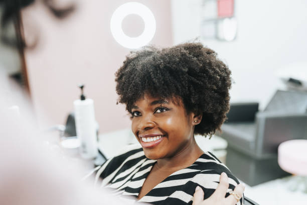 istock Black woman in beauty salon 2160648940