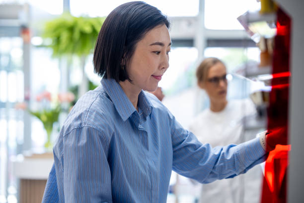 istock A young Korean customer at the Pharmacy. 2160652276