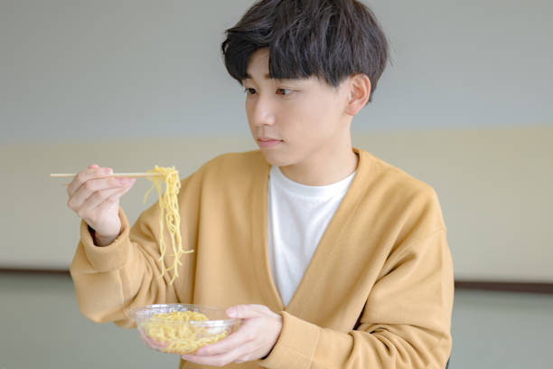 istock Man eat a food 2160655746