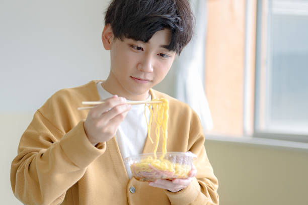 istock Man eat a food 2160655769