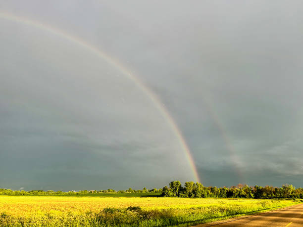istock Gorgeous double rainbow over Wisconsin farm field 2160655800