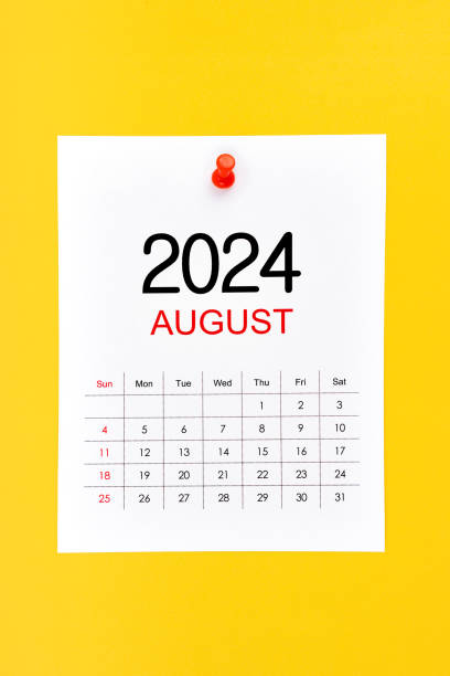 istock August 2024 calendar page with push pin on yellow. 2160658295